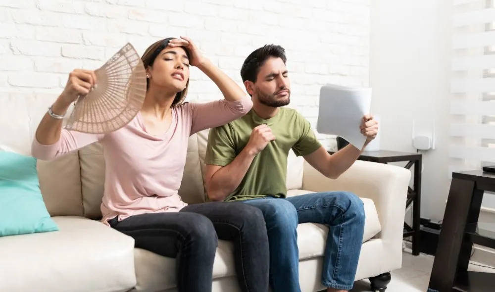 Couple Experiencing Intense Heat