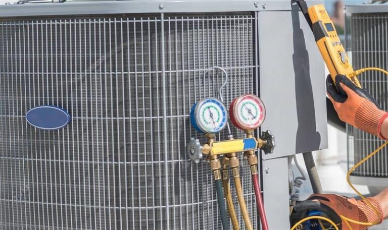 HVAC Technician Checking Air Conditioning Unit with Pressure Gauges